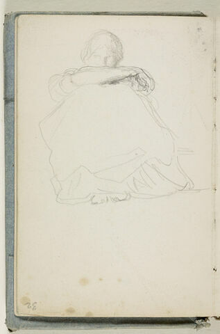 Une figure assise au sol, de face, jambes repliées, image 1/2