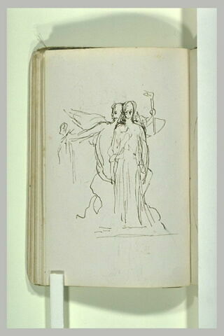 Figure ailée peignant sur un mur le profil d'une femme, image 2/2