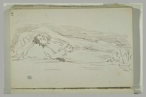 Personnage couché dans des draps, image 2/2