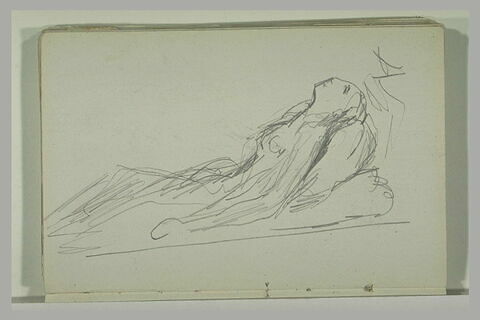 Femme étendue, la tête sur un coussin, image 2/2