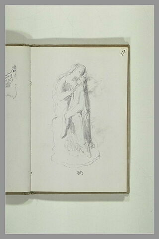 Femme assise, un enfant sur les genoux, image 1/1