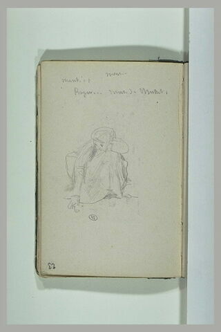 Enfant accroupi et annotation manuscrite, image 1/1