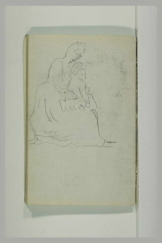 Femme assise, tenant un enfant sur ses genoux, image 1/1