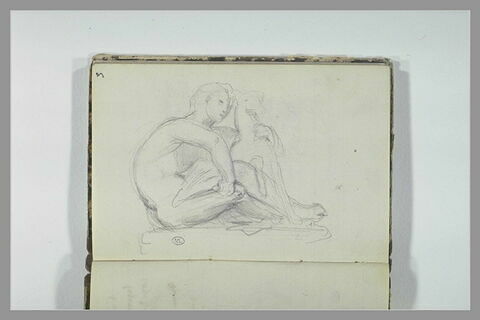 Homme assis avec un chien, image 1/1