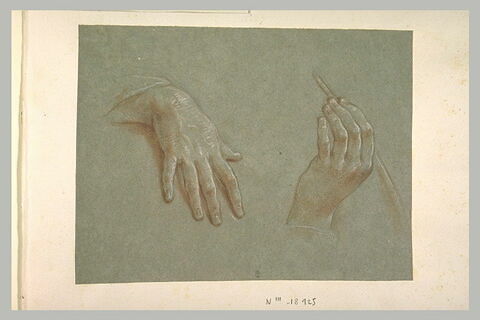 Deux mains, dont l'une tient une plume, image 1/1
