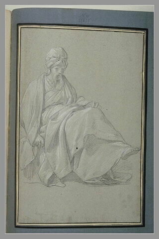 Homme assis, coiffé d'un turban, image 1/1