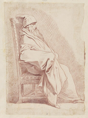 Homme barbu, coiffé d'un bonnet, assis dans un fauteuil, de profil