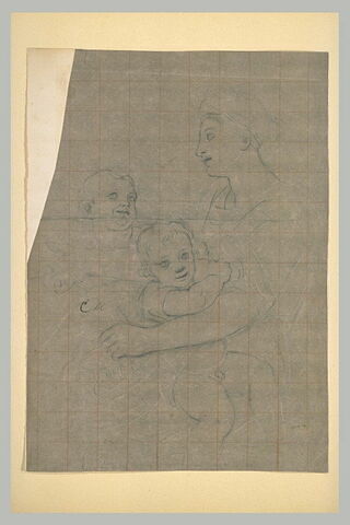 Une femme assise avec deux enfants