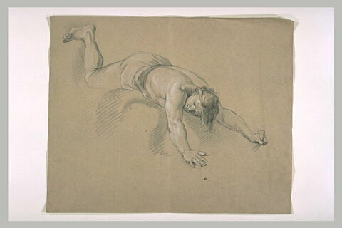 Homme demi-nu, étendu à terre, les bras en avant, image 1/1