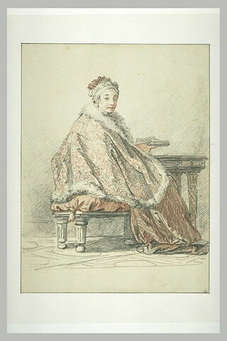 Femme russe assise tenant un livre à la main, image 2/2