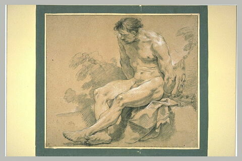 Homme nu, assis, enchaîné à un arbre, image 1/1