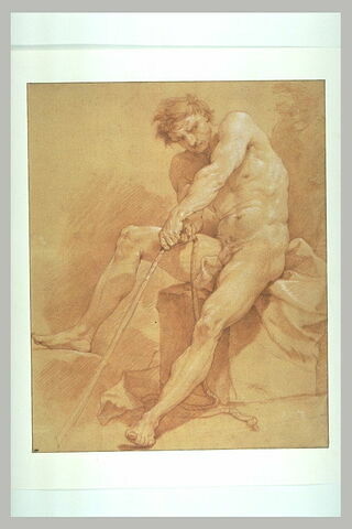 Homme nu, assis, tirant des deux mains sur une corde, image 1/1