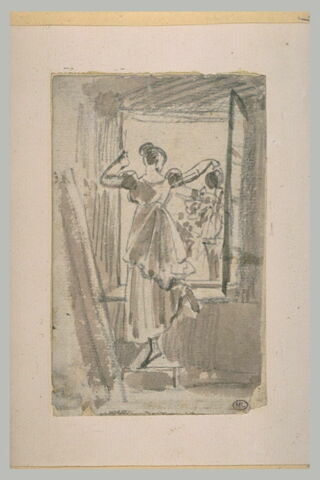 Une femme arrosant des fleurs à sa fenêtre, image 2/2