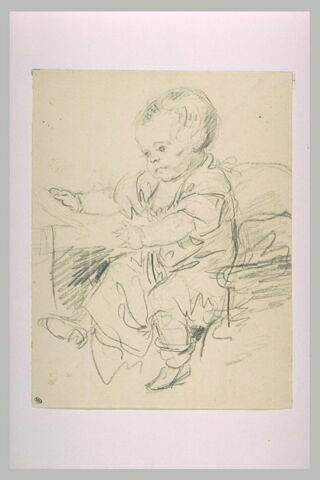 Un jeune enfant assis, en chemise, image 2/2