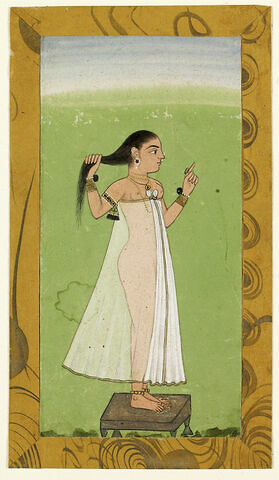 Femme indienne se coiffant, image 1/1