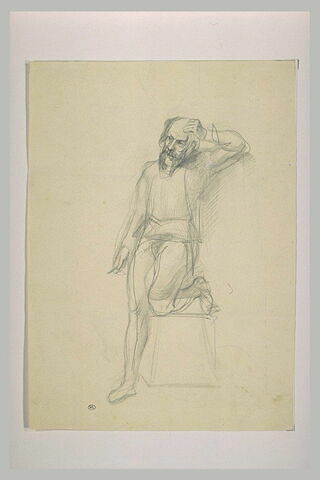 Homme barbu, le genou gauche sur un tabouret, image 1/1