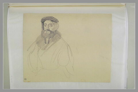 Un homme barbu, coiffé d'un béret, de trois quarts vers la gauche, image 1/1