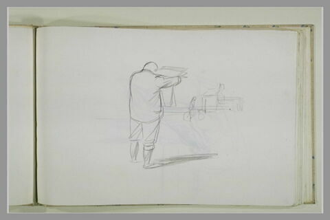 Homme de dos, debout, lisant le journal, image 1/1