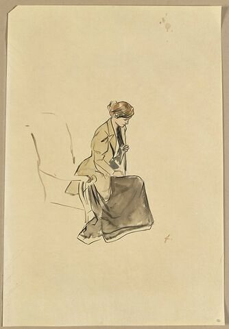 Jeune femme rousse, assise sur le bord d'un fauteuil, image 1/2