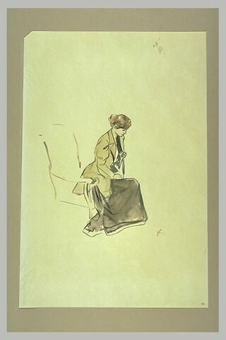 Jeune femme rousse, assise sur le bord d'un fauteuil, image 2/2
