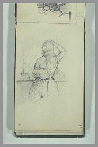 Jeune femme, debout, de dos, devant un miroir, image 2/2