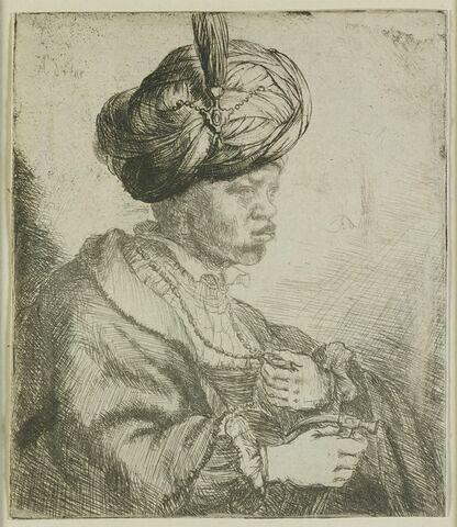 Portrait d'homme au turban avec un médaillon dans sa main gauche