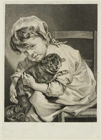 Enfant assis tenant un chien