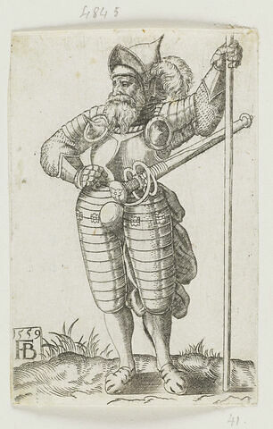 Un soldat portant une armure, une main sur la hanche, appuyé sur une arme, image 1/1