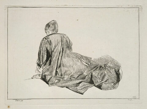 Jeune femme assise à terre, image 1/1
