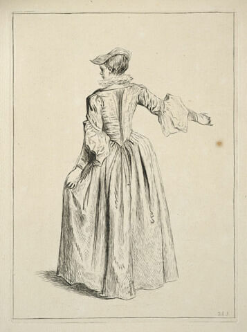Femme debout coiffée d'un petit chapeau, vue de dos, image 2/2