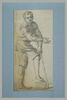 Jeune homme debout, appuyé sur un bâton, le pied sur un socle, image 2/2