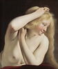 Jeune femme nue, à mi-corps, en train de se peigner, image 4/4