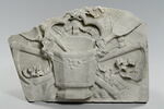Trophée funéraire orne d'un bénitier d'un goupillon et d'outils de fossoyeur. Element du monument funéraire de Valentine Balbiani (1518-1572), épouse de René de Birague, image 1/2