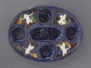 Coupe ovale : cavités et génies en relief, image 1/6