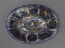 Coupe ovale : cavités et génies en relief, image 3/6