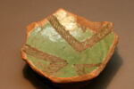 Fragment de la partie inférieure du vase ouvert, image 1/2