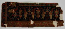 Fragment de tapis à décor d'arabesques fourchues, image 1/2