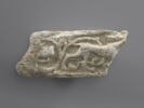 Fragment de décor architectural à l'animal passant, image 1/2