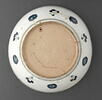 Plat aux palmettes et rumi sur fond rouge tomate, image 4/8