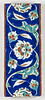 Carreau de bordure à décor de fleurs ondulantes, image 1/2