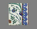 Carreau à décor de tulipes et de roses et aux tiges formant des mandorles, image 1/2