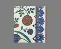 Carreau à décor de tulipes et de roses et aux tiges formant des mandorles, image 1/2