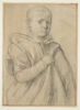 Portrait de jeune garçon tenant sa main droite sur la poitrine, image 1/2