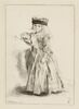 Petite fille en toquet, vêtue d'une robe rayée, debout, image 1/2